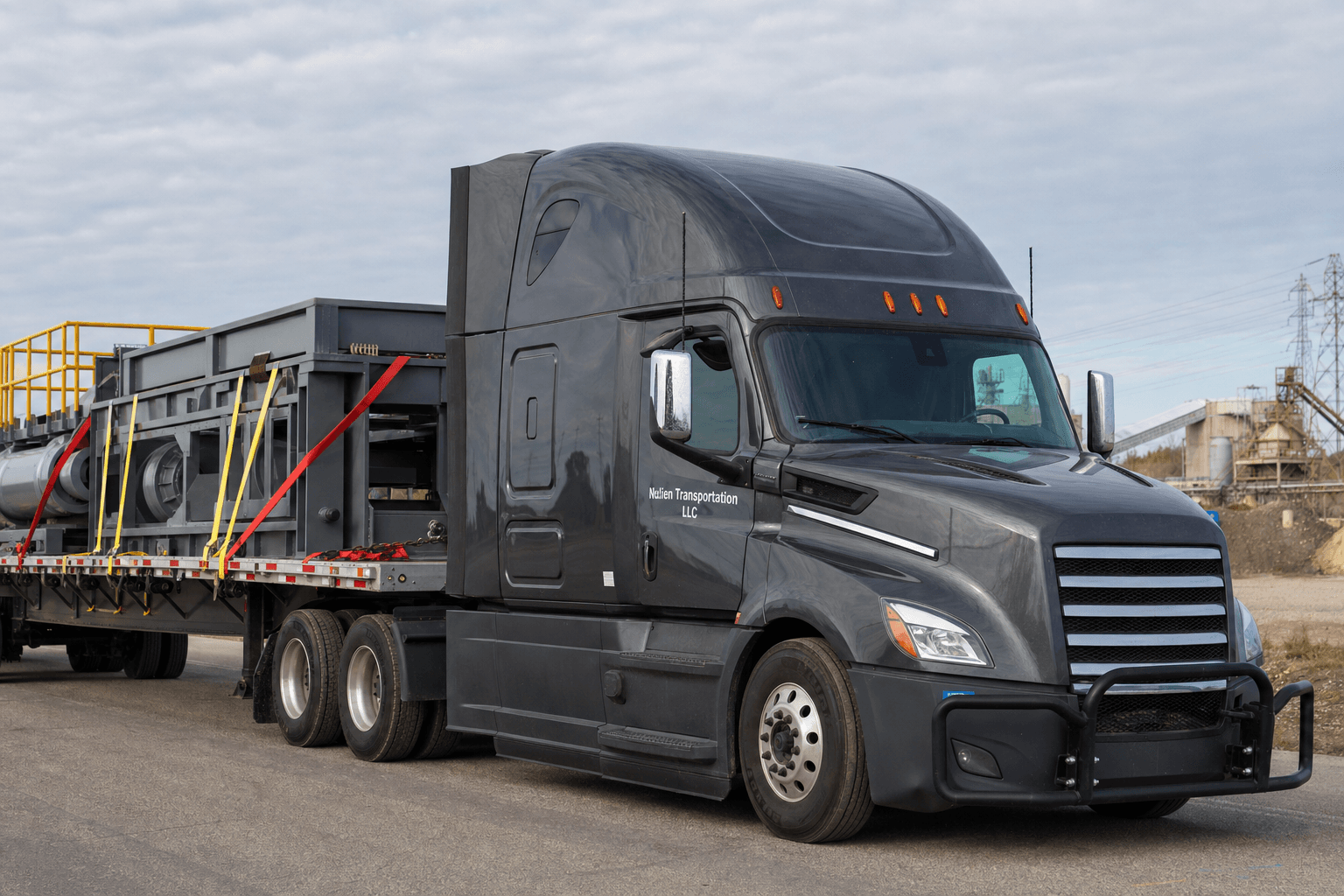 Nulien Transportation flatbed with secured heavy freight