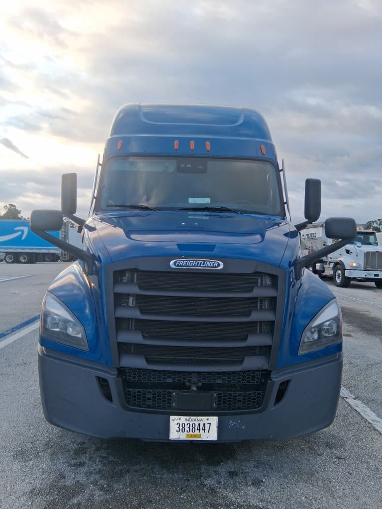 Nulien Transportation royal blue Freightliner Cascadia tractor